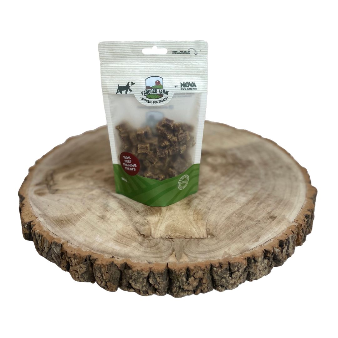All natural beef training treats in a packet on a wooden background