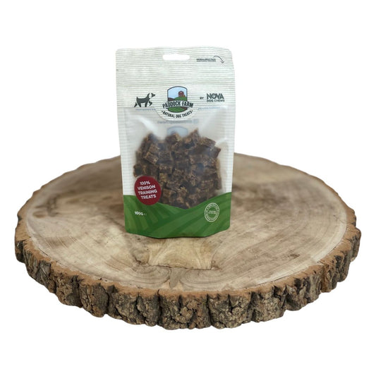 A bag of natural venison training treats on a wooden background