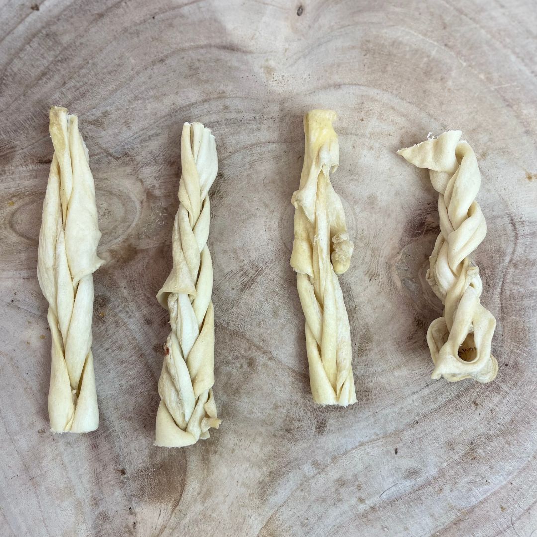 All naturl dried braided lamb skin on a wooden background