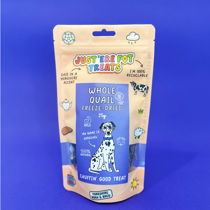 Front view of a packet / pouch of 'just'ere for treats' all natural freeze dried whole quail on a plain blue background 