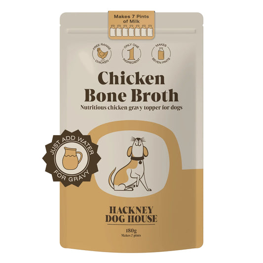 Front view of a packet/ pouch of natural chicken bone broth powder to make gravy topper for dogs. On a white background