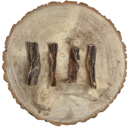 All natural dried Buffalo flat gullet on a wooden background