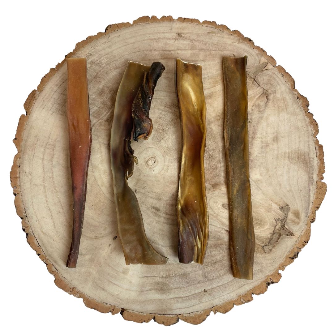 All natural camel skin roll on a wooden background