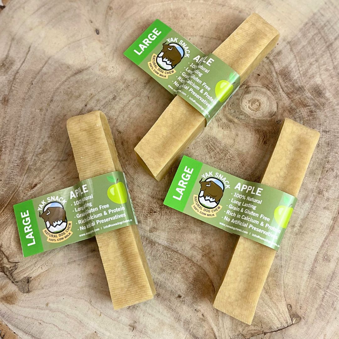 All natural yak milk chews apple flavour on a wooden background 